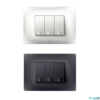 3 module legrand lyncus switch in white background. white an black colored switches.