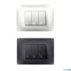3 module legrand lyncus switch in white background. white an black colored switches.